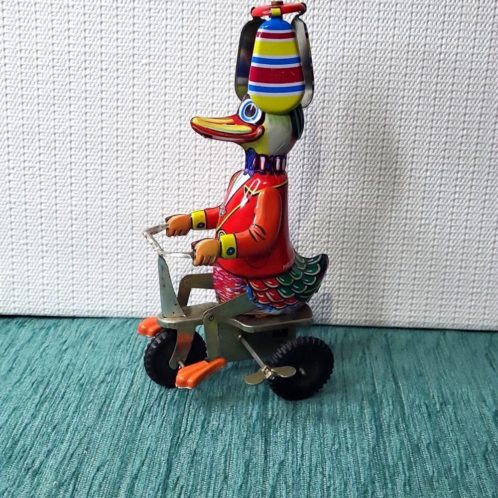 Vintage Tin Toy Wind Up Duck on a Tricycle Bike